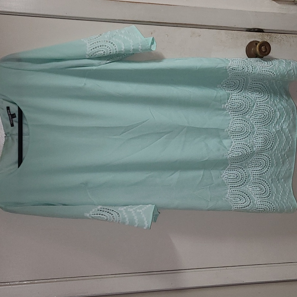Gianni Bini light teal sheath dress. Fully lined.